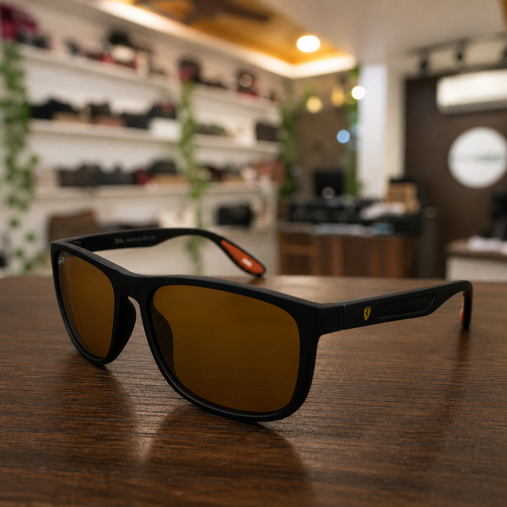Ray-Ban polarized rectangular sunglasses in matte black frame with amber-brown lenses, temple and hinge detail