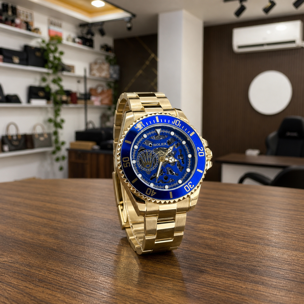 Angled Rolex blue skeleton automatic gold-tone watch in office