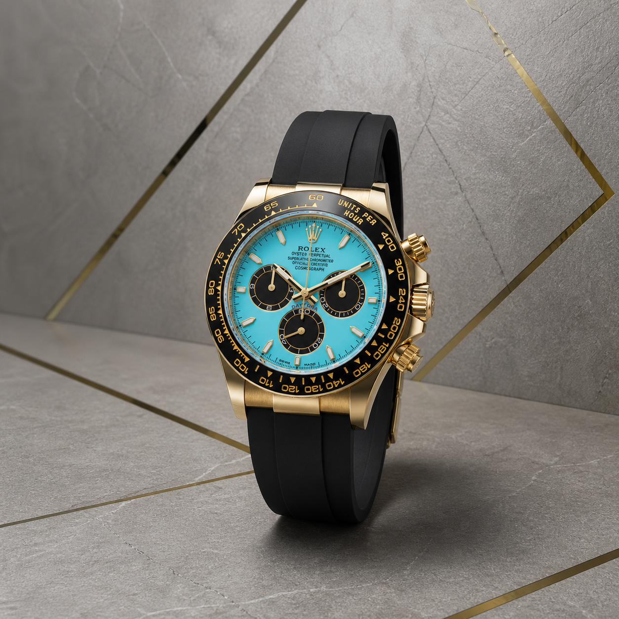 Rolex Daytona-style ice-blue dial watch on grey geometric office wall