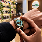 Rolex Daytona-style automatic watch with Tiffany-blue dial, front wrist view