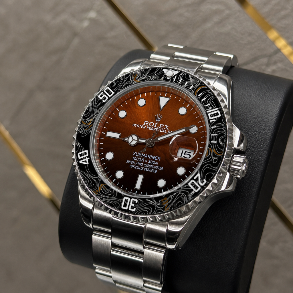 Rolex Submariner orange dial and patterned black bezel close-up