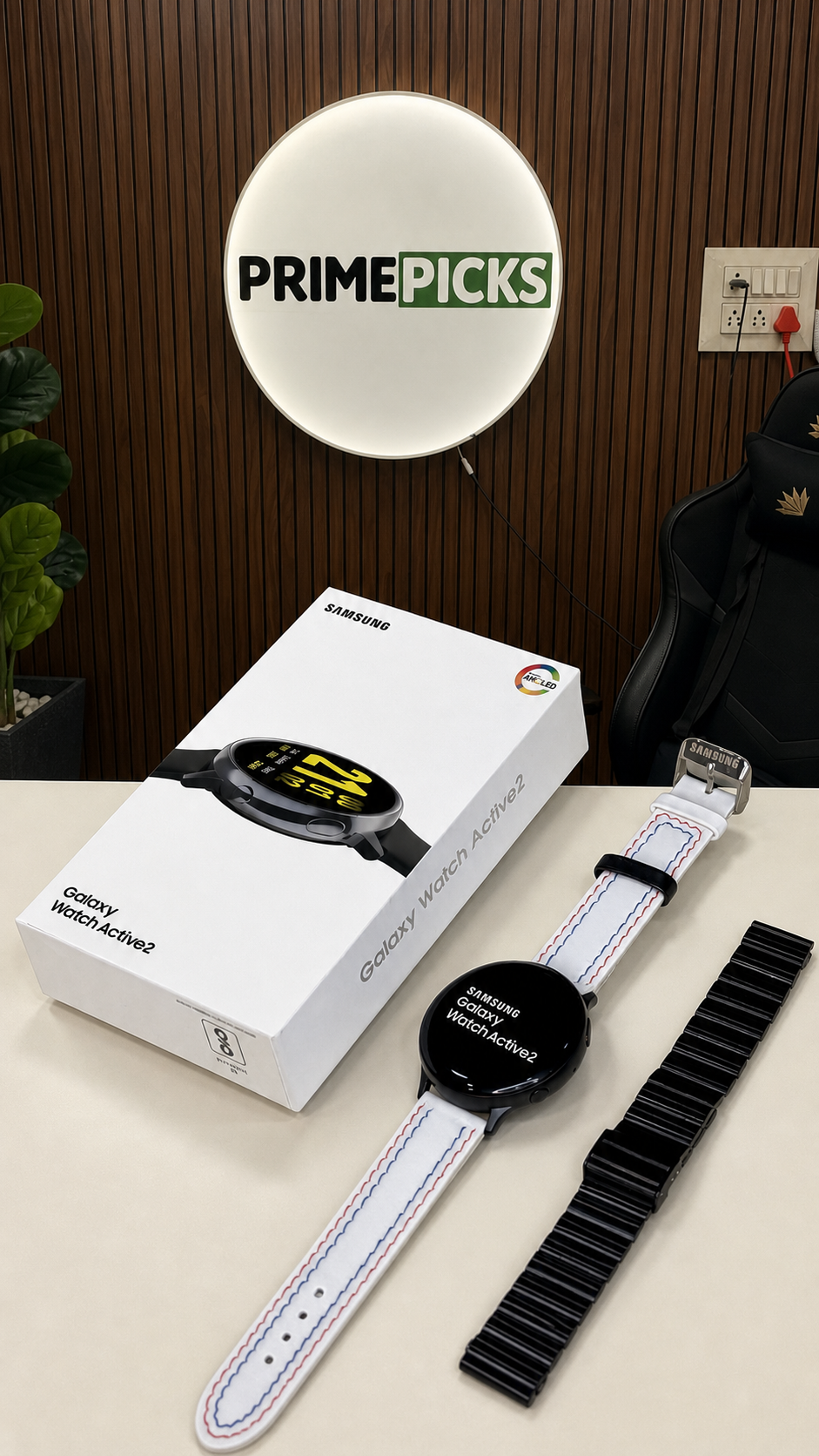 Samsung Galaxy Watch Active2 complete set in front of the Primepicks logo board