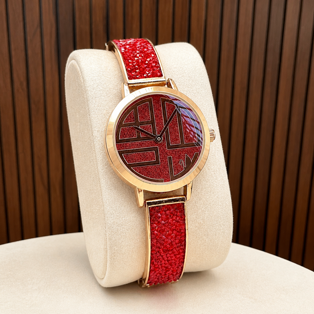 Close-up of Swarovski Cosmic Rock red and rose gold tone women's watch at the Primepicks wood wall