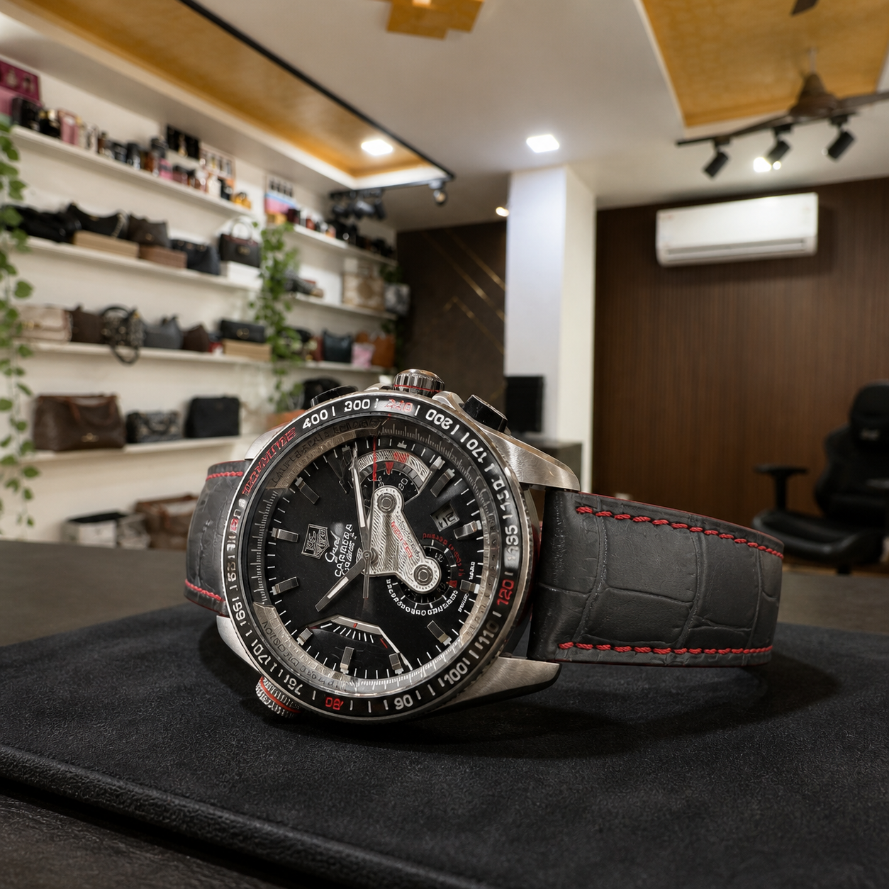 Horizontal view of TAG Heuer Carrera Calibre 36 chronograph on a display pad in the Primepicks office