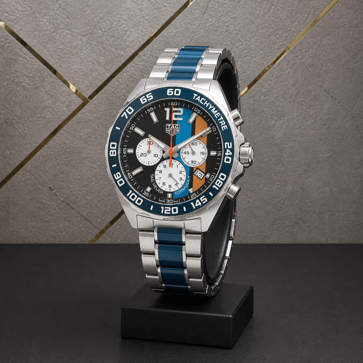 Tag Heuer Formula 1 Chronograph against the grey and gold office wall