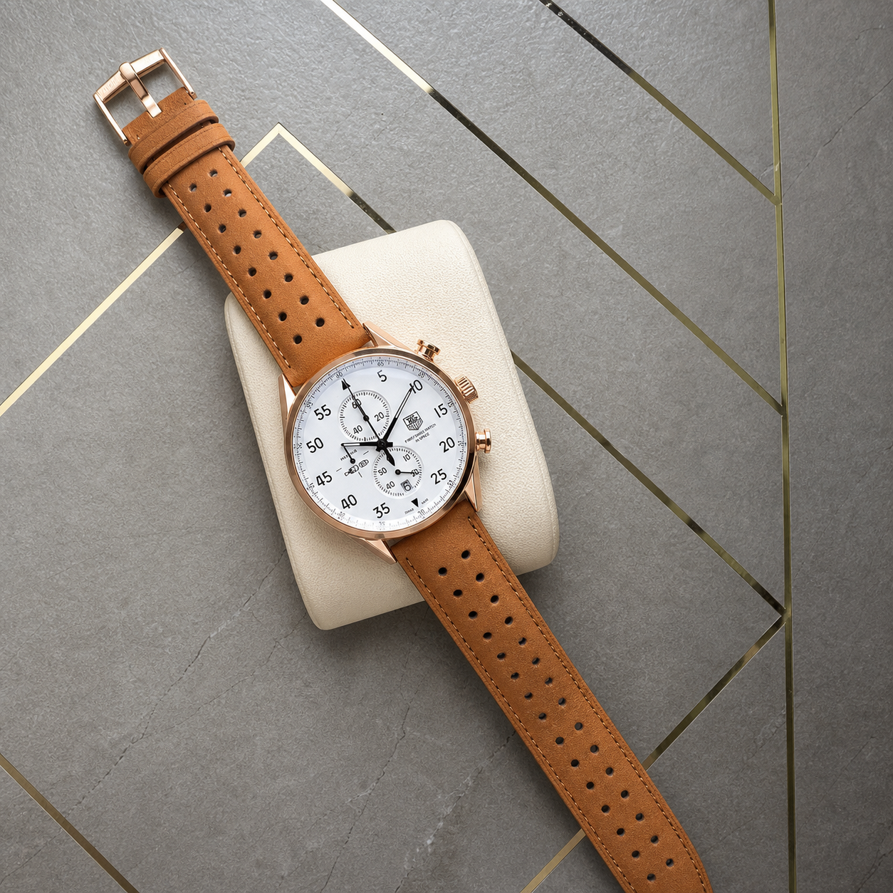 TAG Heuer SpaceX white dial men's watch flat lay at the Primepicks grey and gold office wall