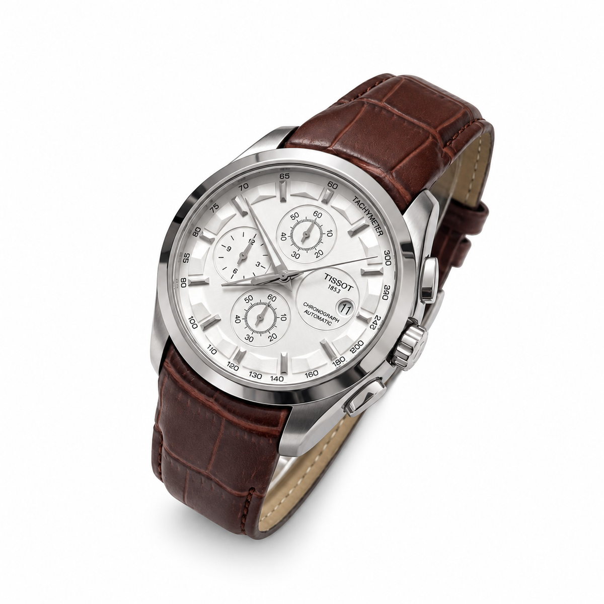 Silver case white dial brown leather strap Tissot Couturier-style watch on white background