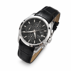 Silver case black dial black leather strap Tissot Couturier-style watch on white background