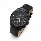 All-black case black dial black leather strap Tissot Couturier-style watch on white background