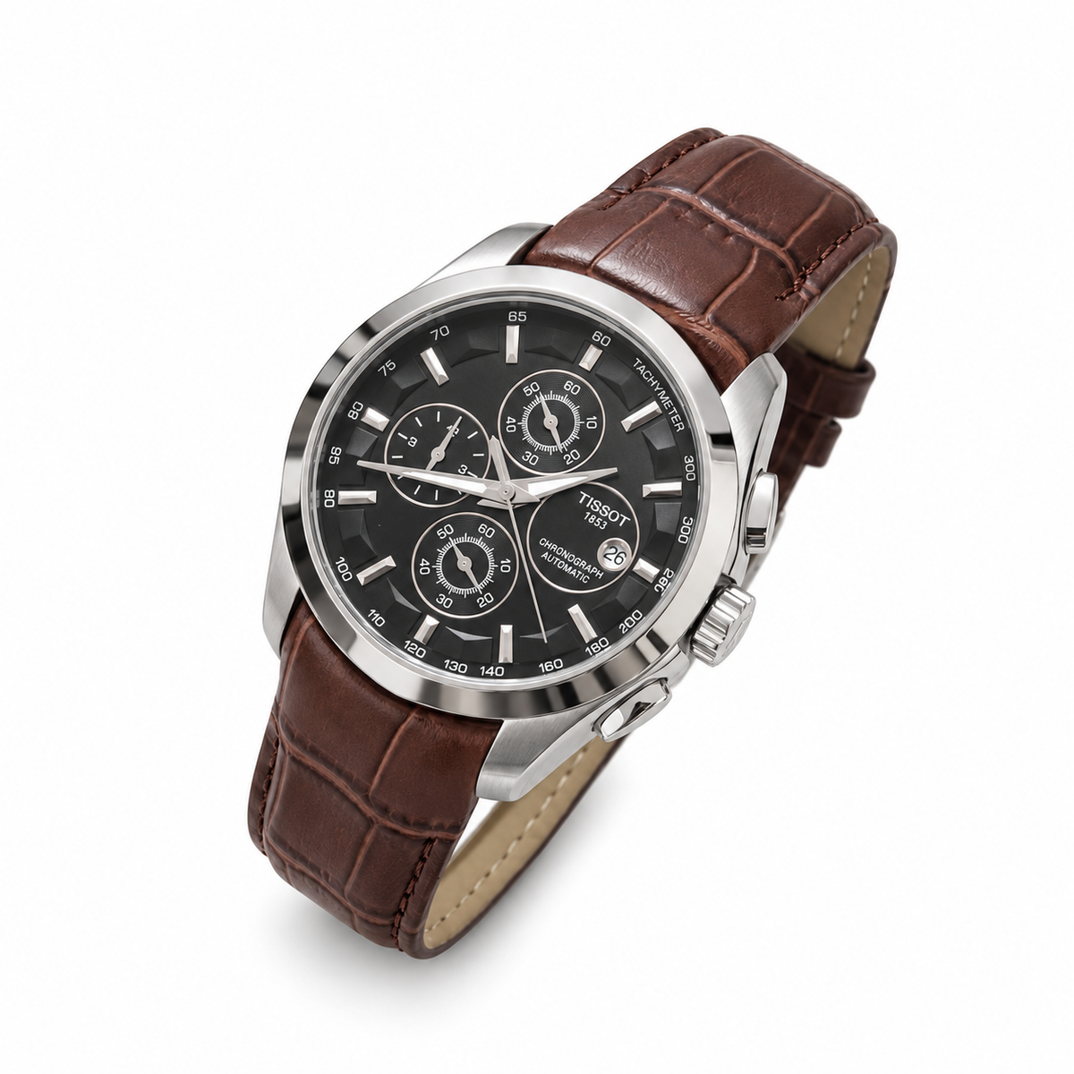 Silver case black dial brown leather strap Tissot Couturier-style watch on white background