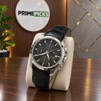 Silver case black dial black leather strap Tissot Couturier-style watch in PrimePicks office