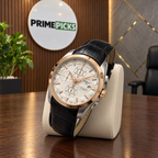 Rose-gold bezel white dial black leather strap Tissot Couturier-style watch in PrimePicks office