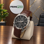 Silver case black dial brown leather strap Tissot Couturier-style watch in PrimePicks office