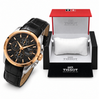 Rose-gold bezel black dial black strap watch with matching OG box