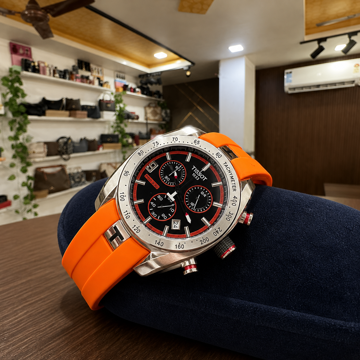 Tissot PRS 330 Tony Parker watch on a navy display cushion in the Primepicks office
