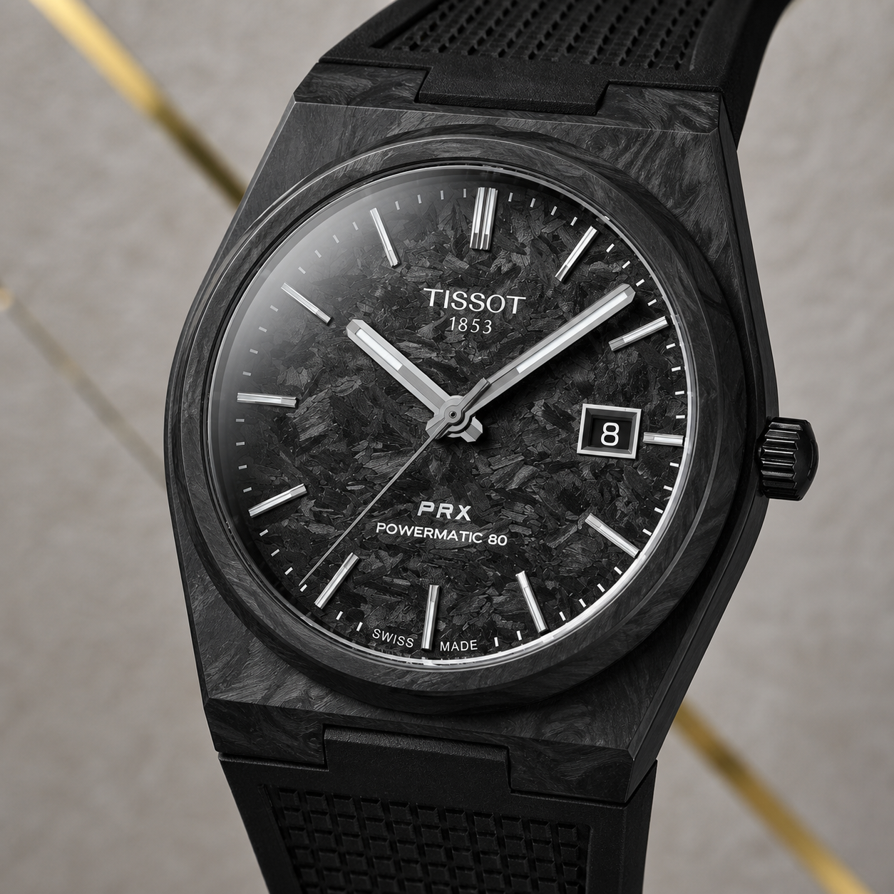 Tissot PRX Powermatic 80 Carbon Black watch carbon-pattern dial and date detail