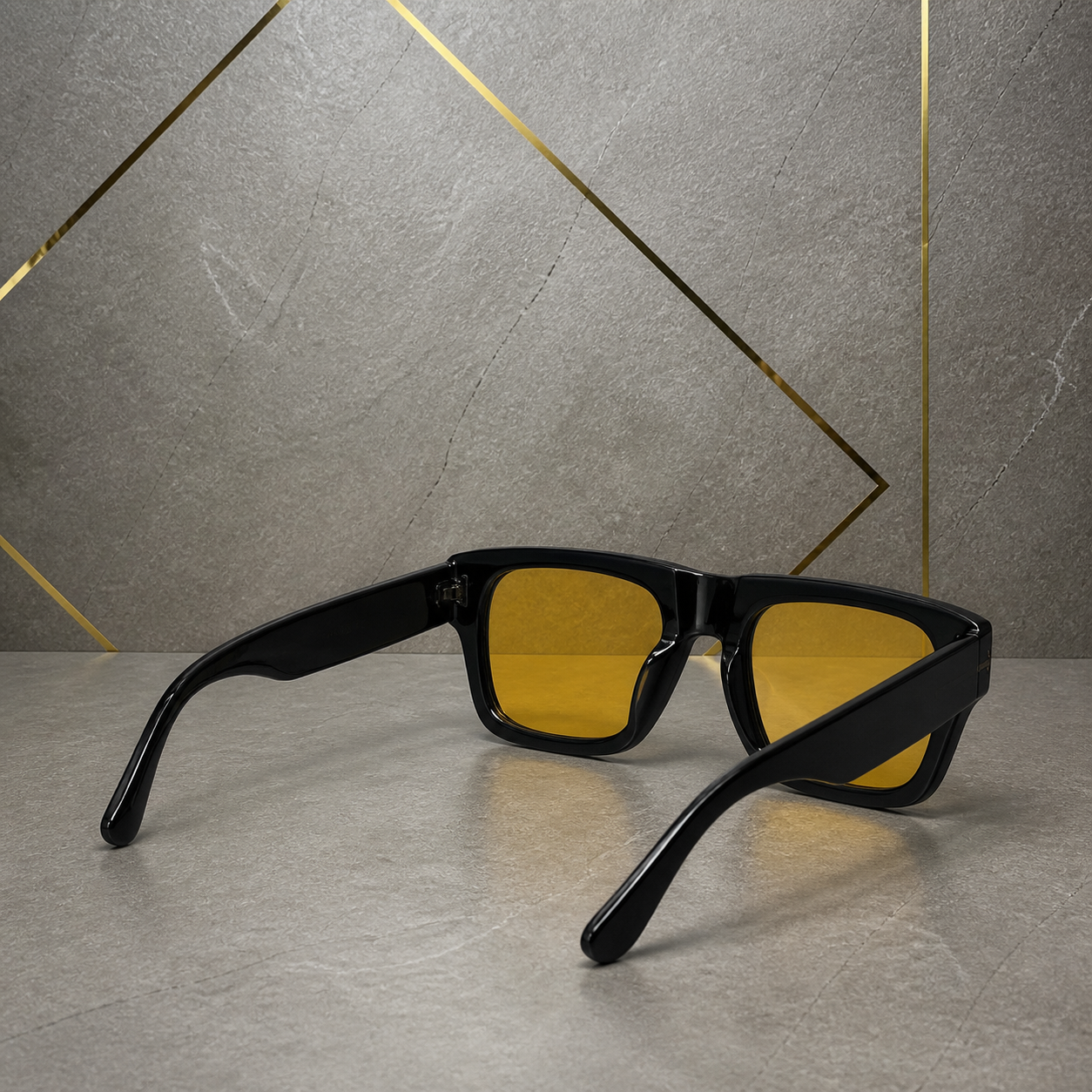 Rear three-quarter view of black square sunglasses with wide temples