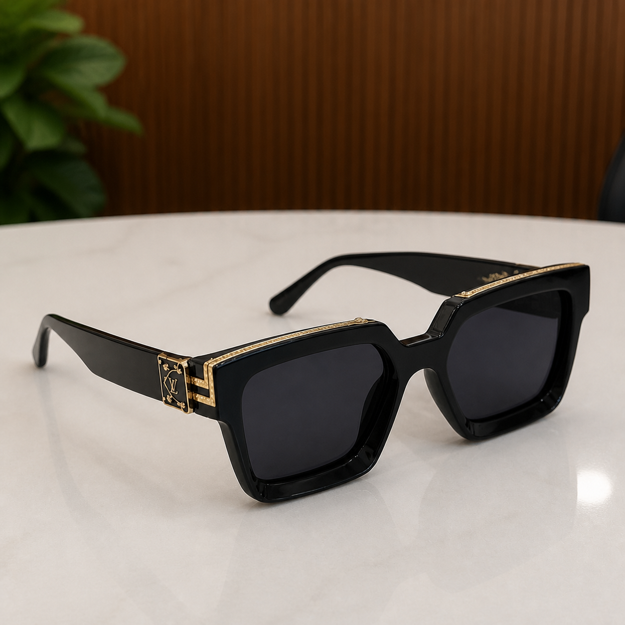 Louis Vuitton black angular square sunglasses with gold-tone accents and charcoal lenses, elevated front view