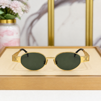 Celine gold-tone oval sunglasses with green lenses, front view