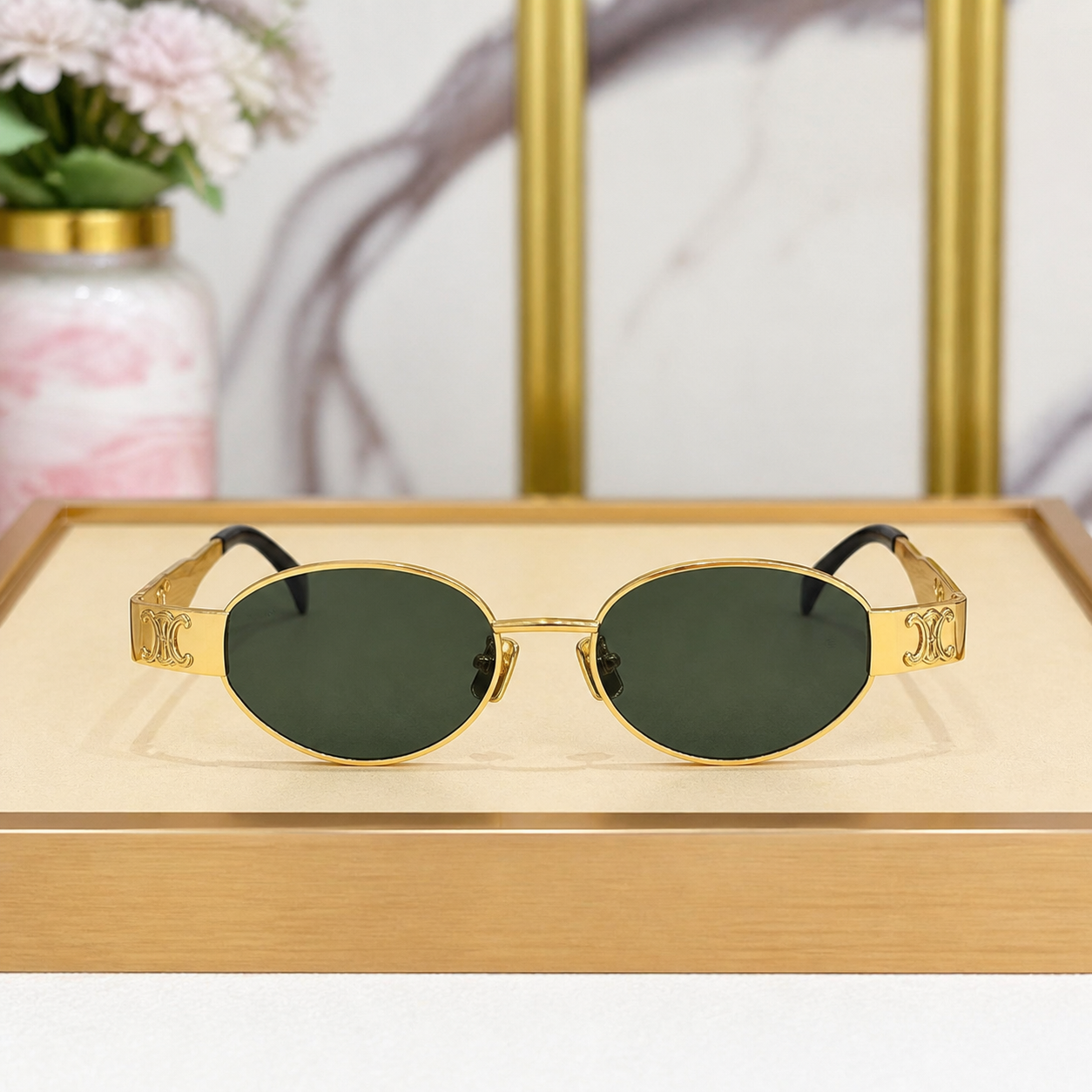 Celine gold-tone oval sunglasses with green lenses, front view