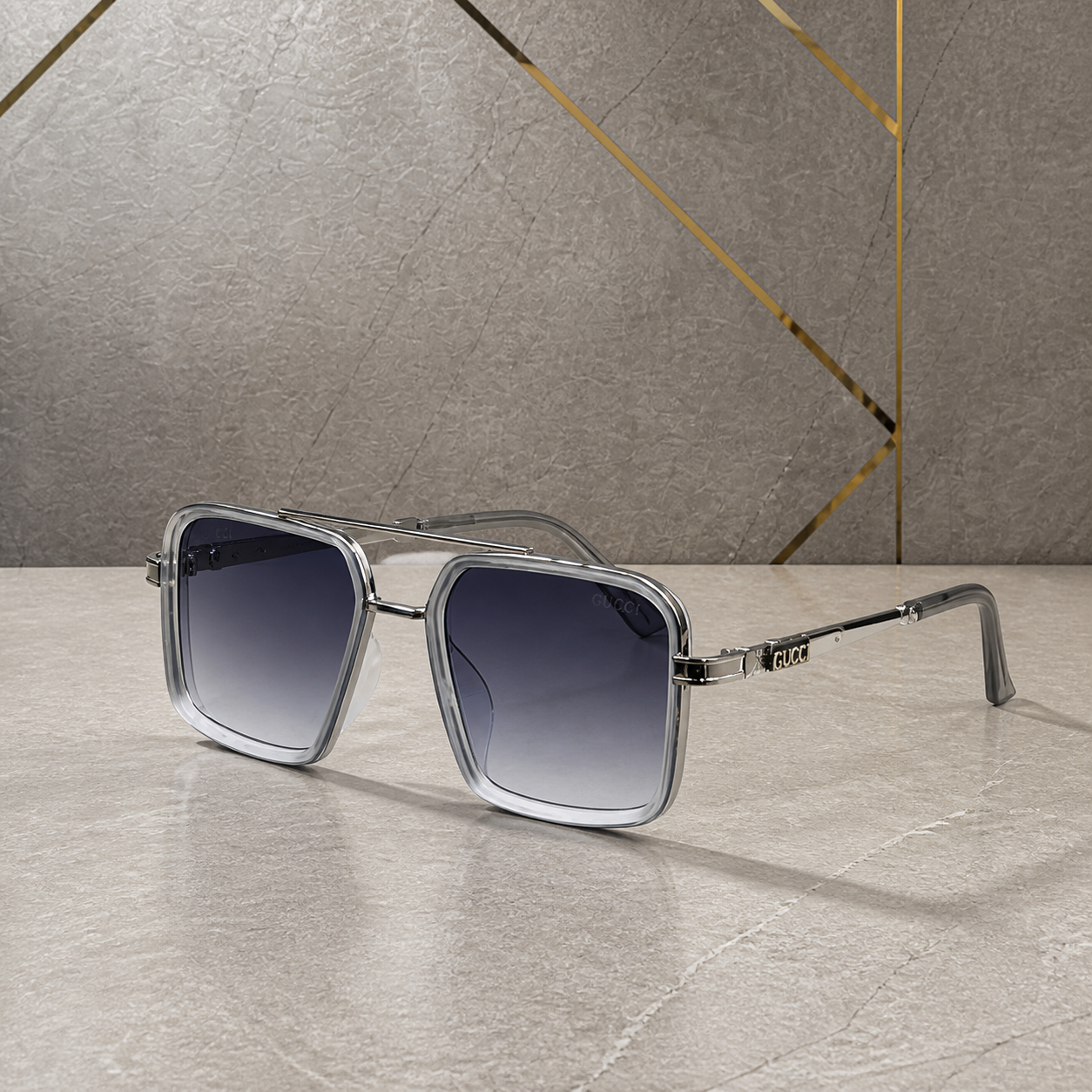 Gucci silver square double-bridge sunglasses with smoke gradient lenses, front three-quarter hero view