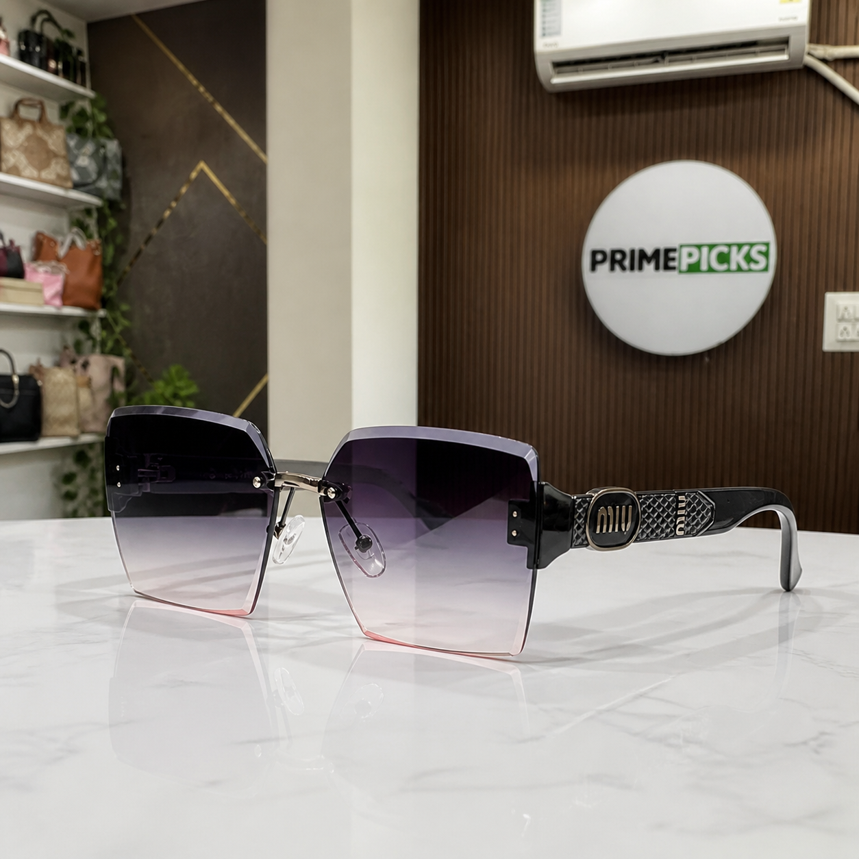 Miu Miu black-temple oversized rimless square sunglasses with gunmetal-tone hardware and smoky mauve gradient lenses, front three-quarter hero view