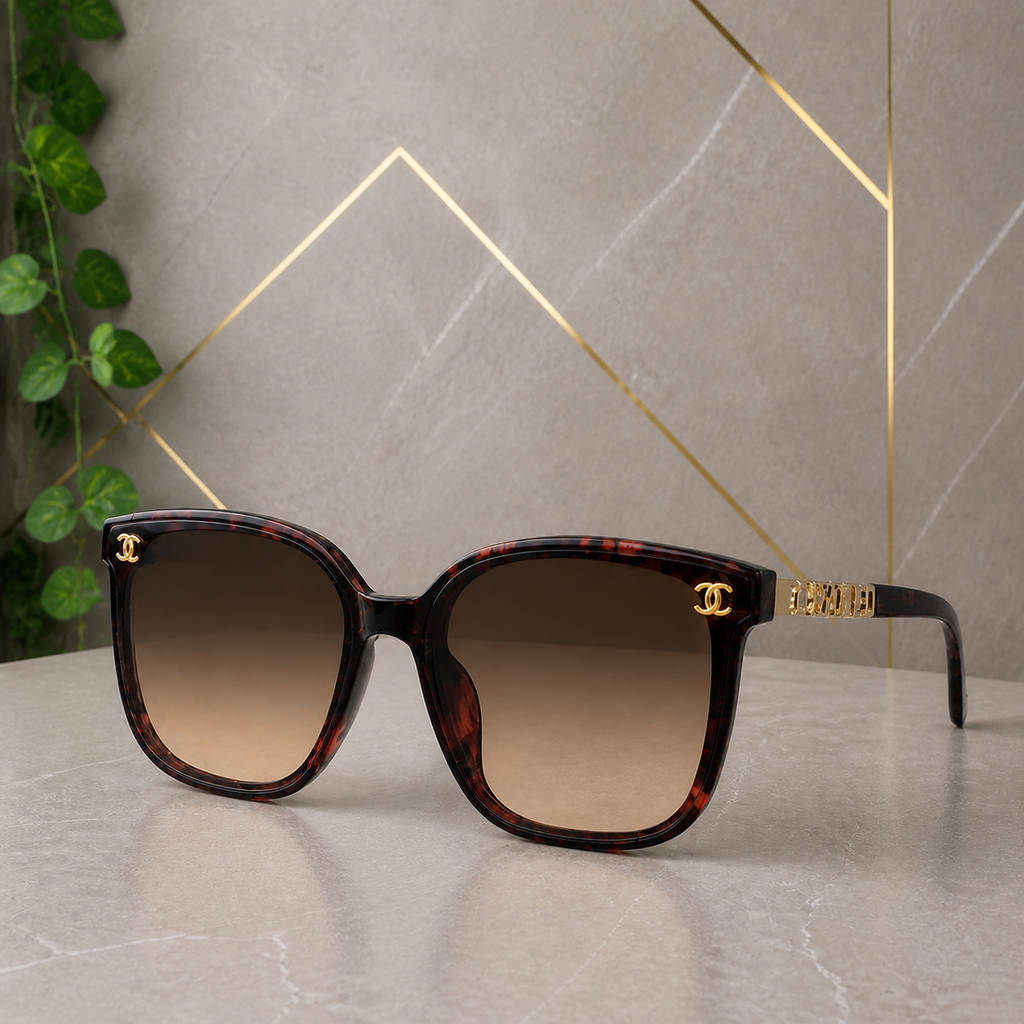 Chanel burgundy tortoiseshell butterfly sunglasses with brown gradient lenses, elevated front view