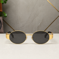 Celine gold-tone oval sunglasses with smoke lenses, front view