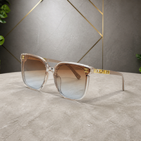 Chanel crystal-blush butterfly sunglasses with brown gradient lenses, front three-quarter hero view