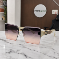 Miu Miu ivory-temple oversized rimless square sunglasses with gold-tone hardware and brown-to-rose gradient lenses, front three-quarter hero view