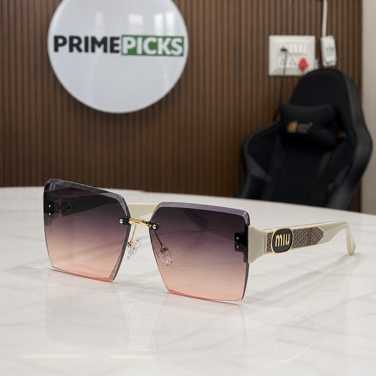 Miu Miu ivory-temple oversized rimless square sunglasses with gold-tone hardware and brown-to-rose gradient lenses, PrimePicks office lifestyle view