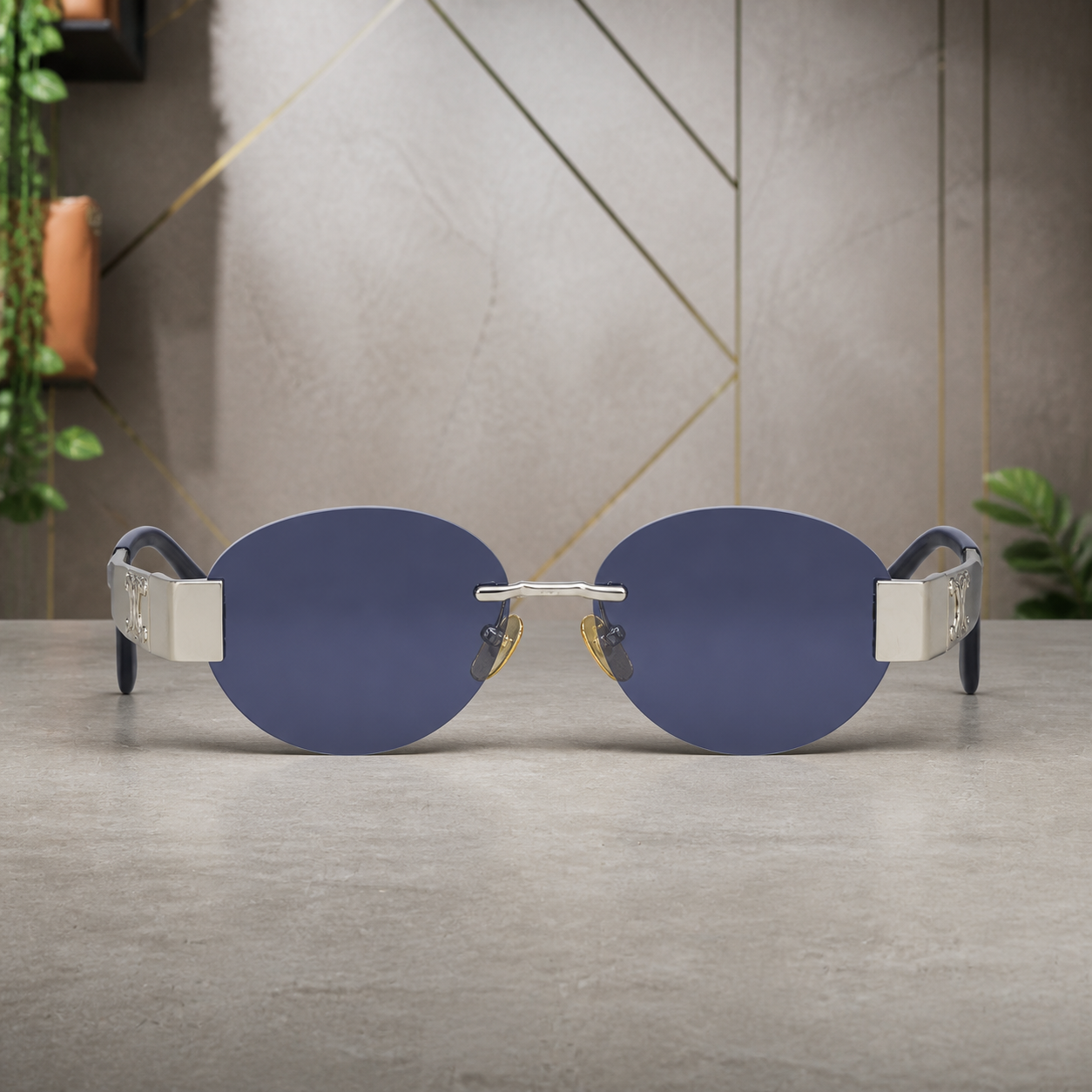 Celine silver-tone rimless round sunglasses with blue-violet lenses, front view