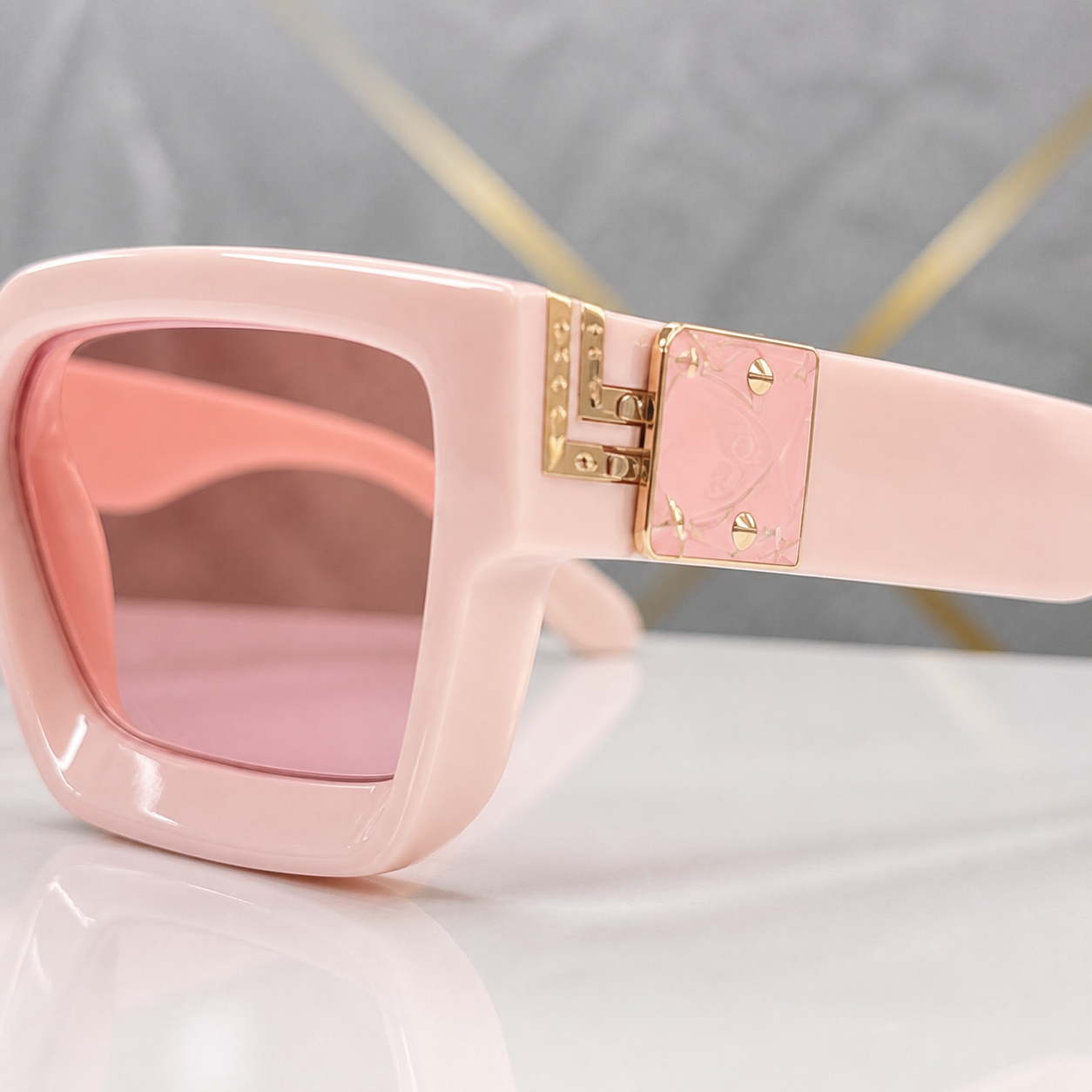 Louis Vuitton blush pink angular square sunglasses with pink lenses, decorative hinge detail