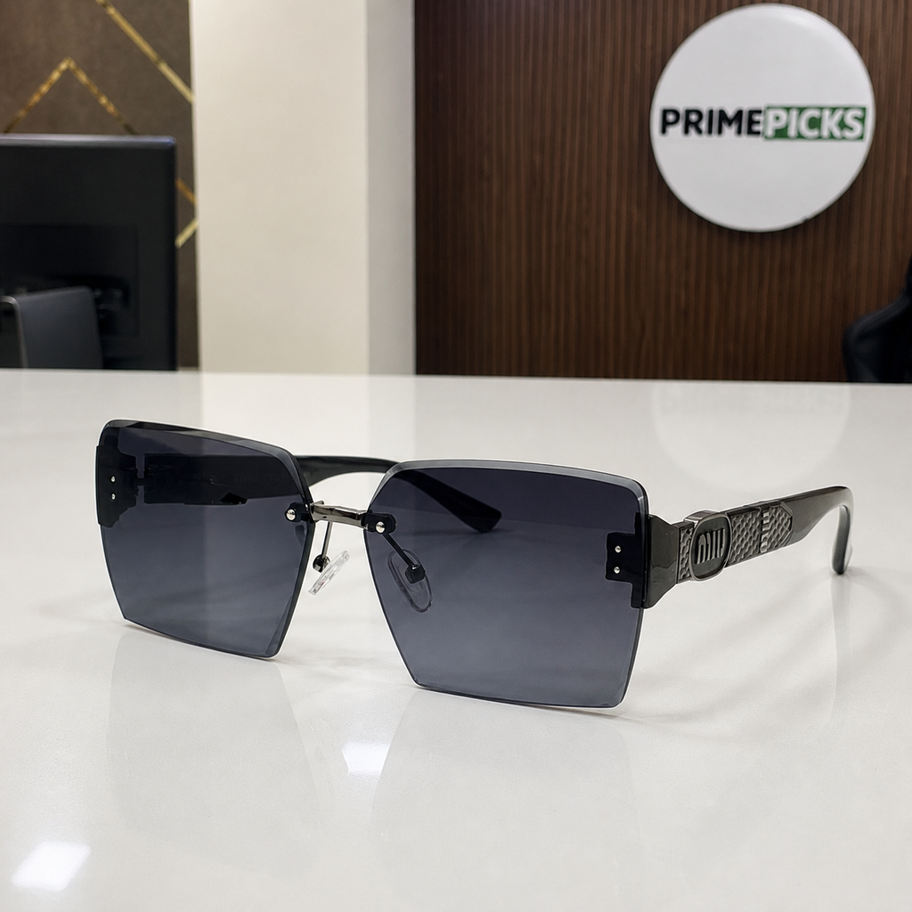 Miu Miu dark brown-temple oversized rimless square sunglasses with gunmetal-tone hardware and dark smoke-blue gradient lenses, PrimePicks office lifestyle view