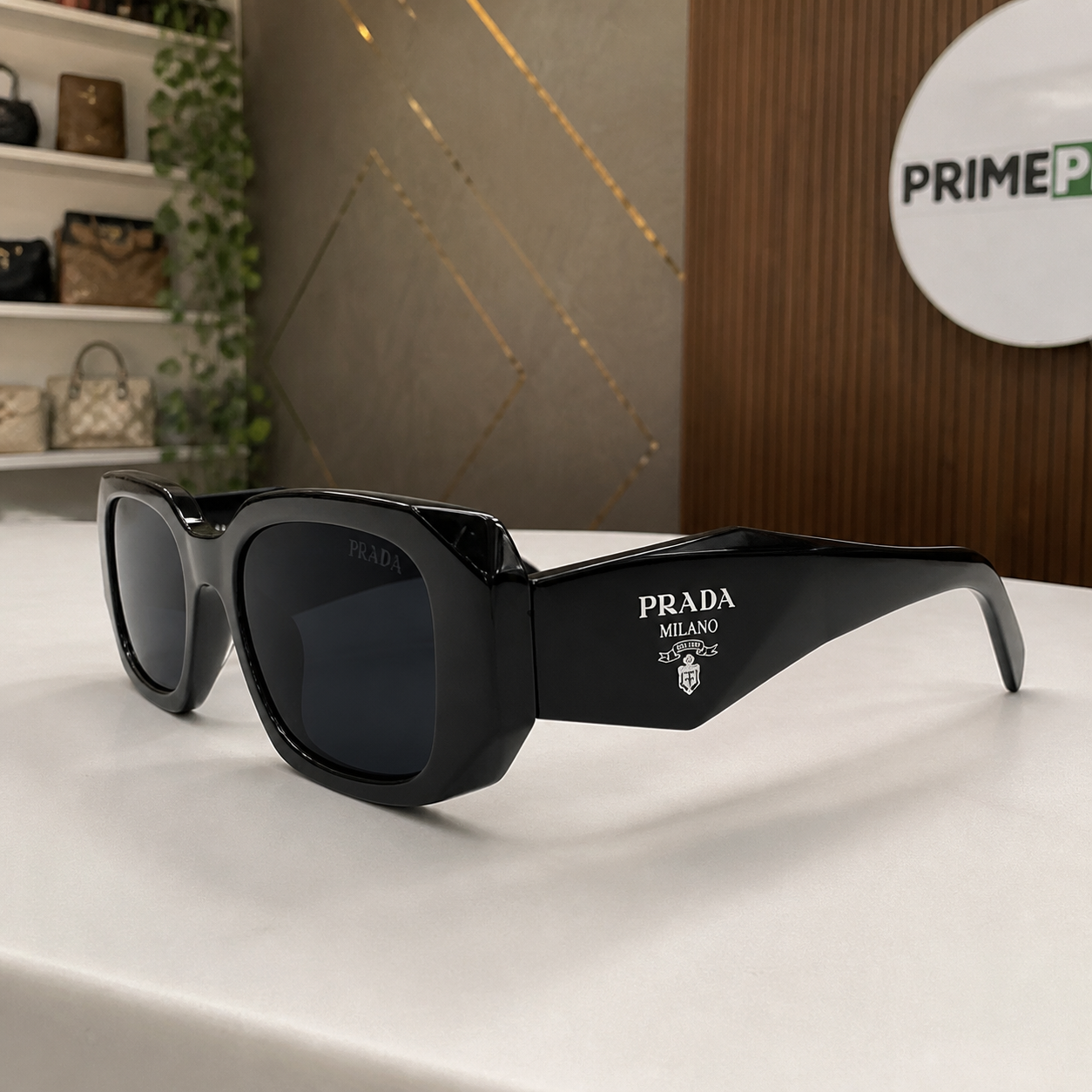 Prada Gloss Black and Dark Smoke sunglasses - temple detail