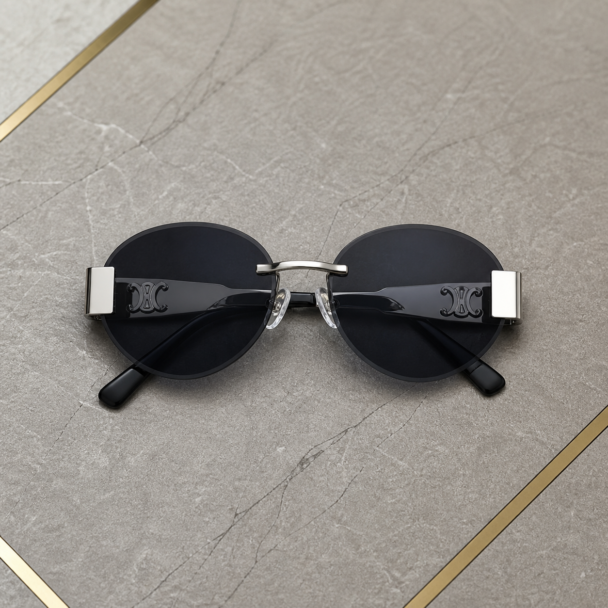 Celine silver-tone rimless round sunglasses with smoke lenses, folded overhead view