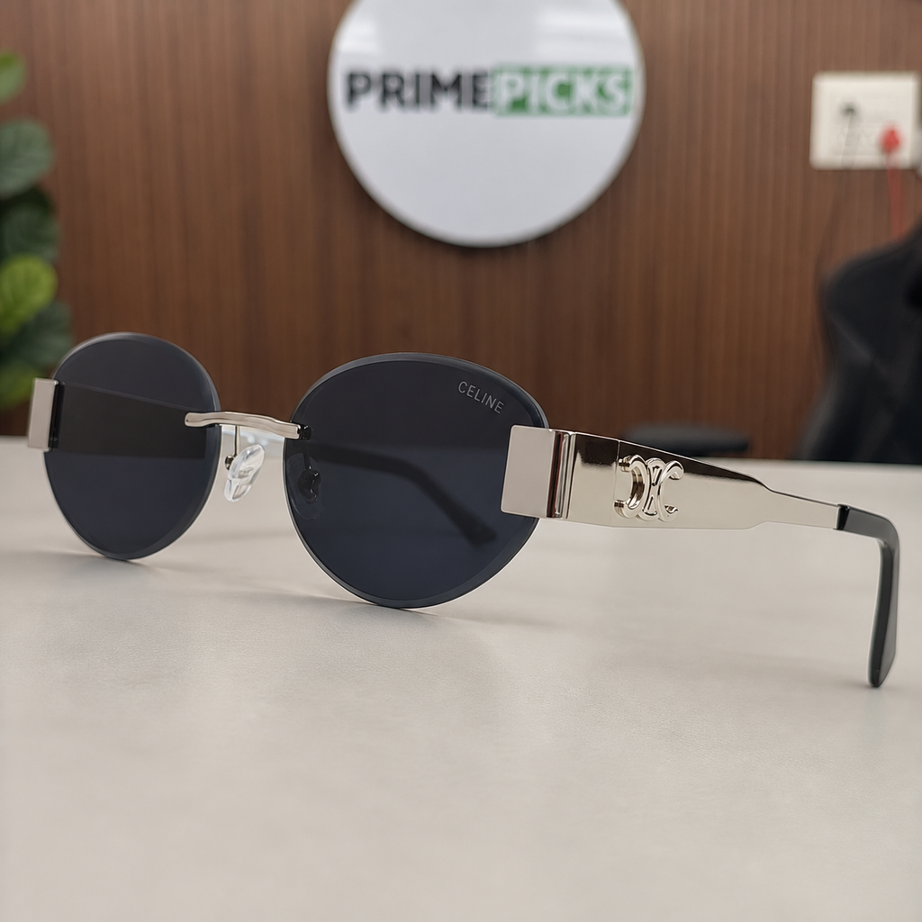 Celine silver-tone rimless round sunglasses with smoke lenses, ornate hinge detail