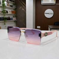 Miu Miu blush pink-temple oversized rimless square sunglasses with gold-tone hardware and violet-to-rose gradient lenses, front three-quarter hero view