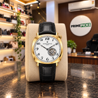 Vacheron Constantin open-heart men’s watch in gold with white dial and black strap at the PrimePicks office