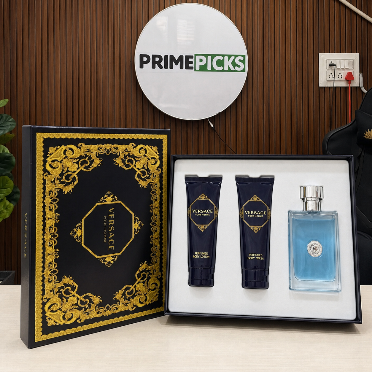 Versace Pour Homme three-piece perfume gift set in the PrimePicks office with the PrimePicks sign